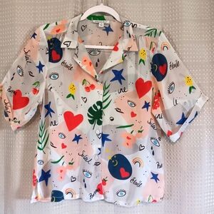Lily and Lionel ladies short sleeve button down blouse.
